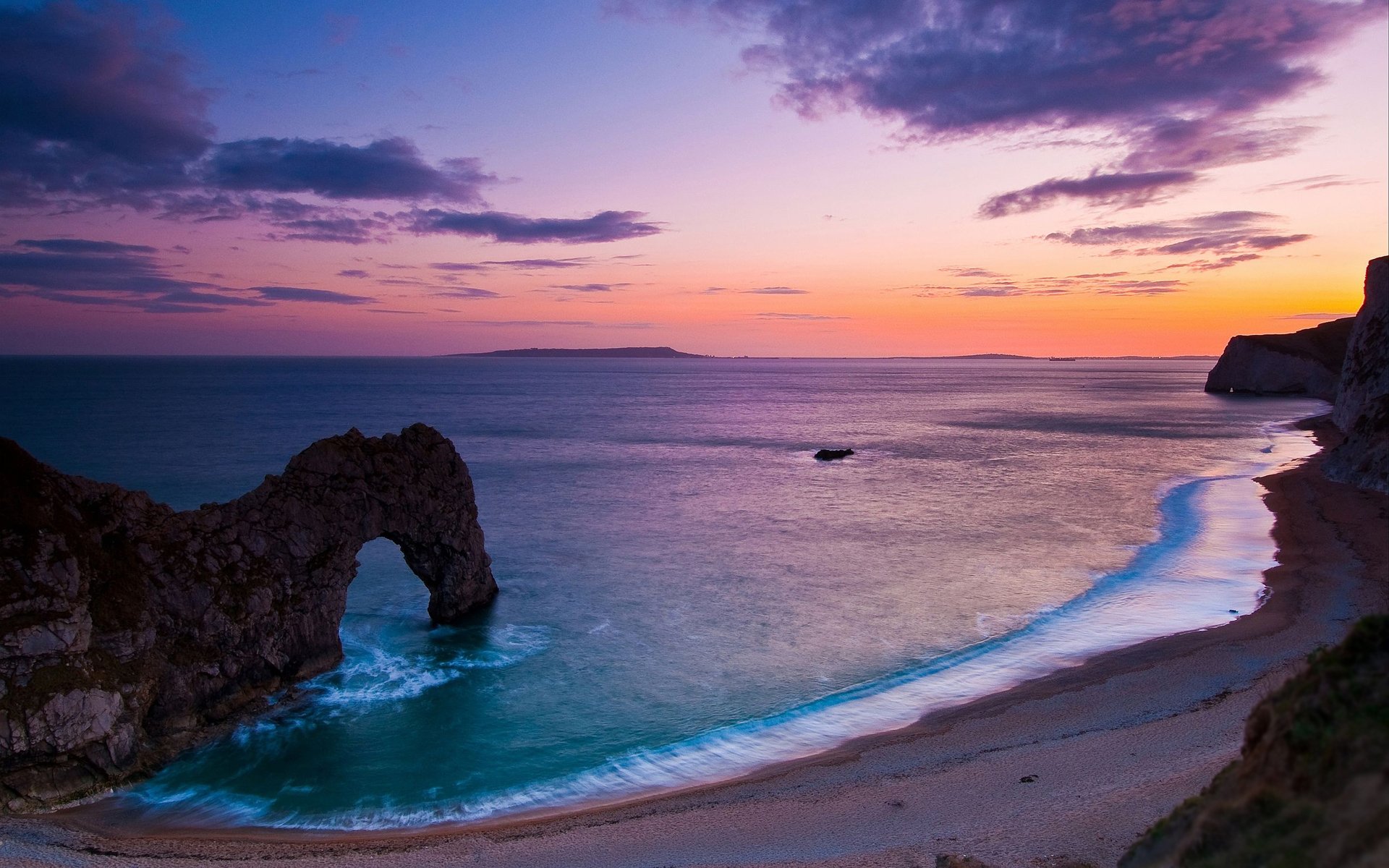 paysage nature mer océan eau côte ciel côte cailloux roche roches arche arches soir