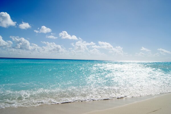 The blue of the sky merges with the brilliance of the water