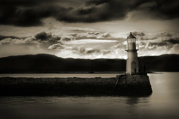 Black and white landscape. Lighthouse