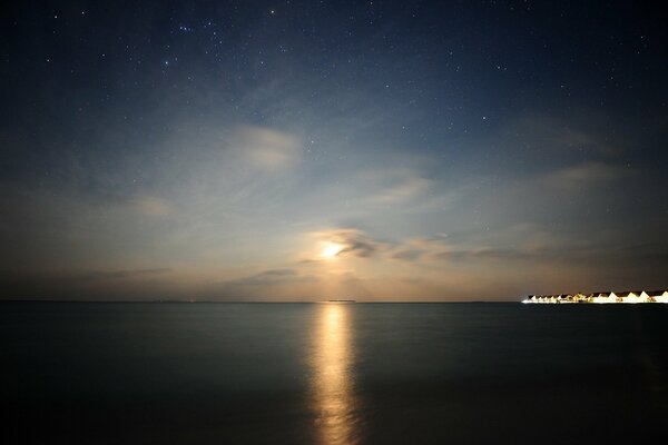 Reflection of the sun in the ocean in the Maldives