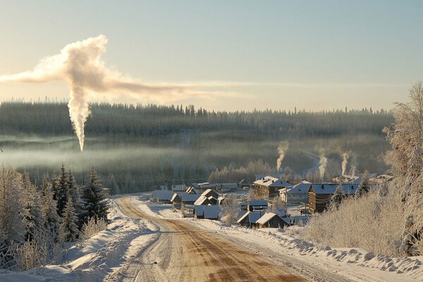Zimowy krajobraz poranek na wsi