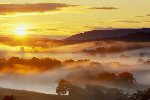 A peaceful sunset in the valley of mists