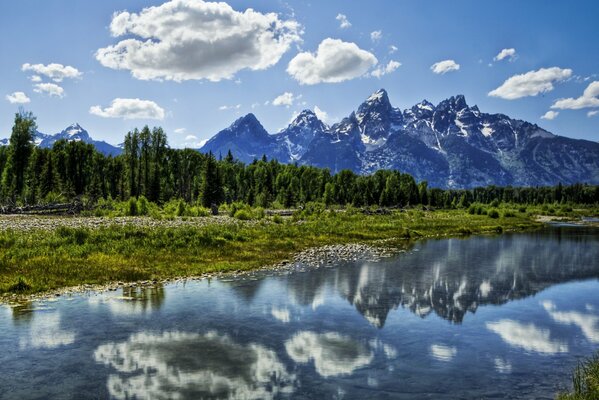 Clouds on the background of high mountains