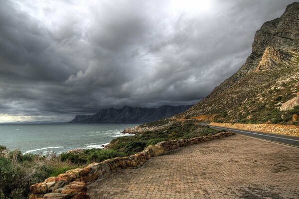 Storm clouds. Landscape sea and mountains