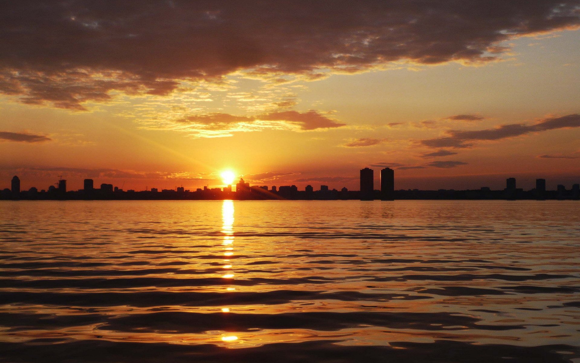 tramonto onde città cielo