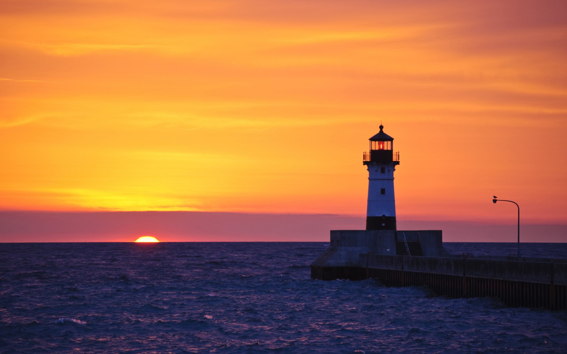 meer leuchtturm sonnenuntergang