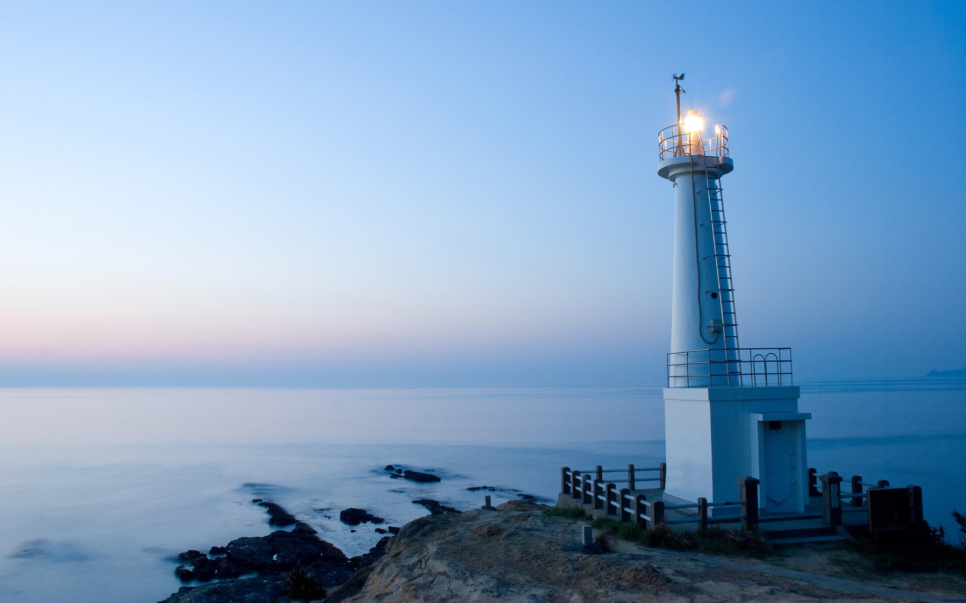 noche faro océano camino