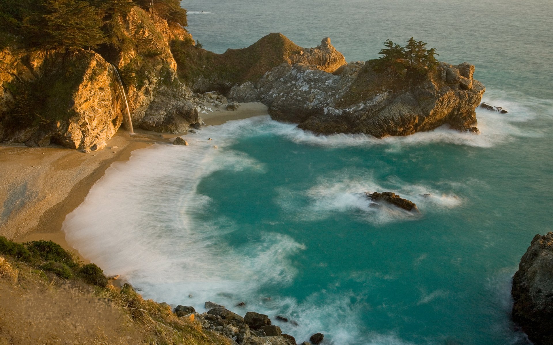 mar playa roca arena