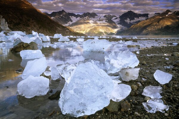 Chunks of ice on the horizon near the mountain