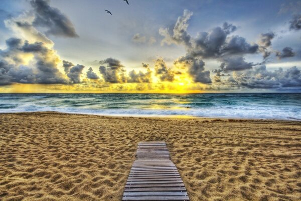 Path to the sun and beautiful sky on the beach