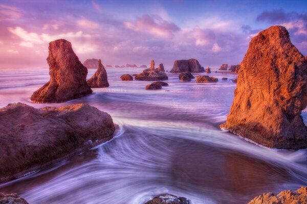 Sea with big rocks, lilac sea