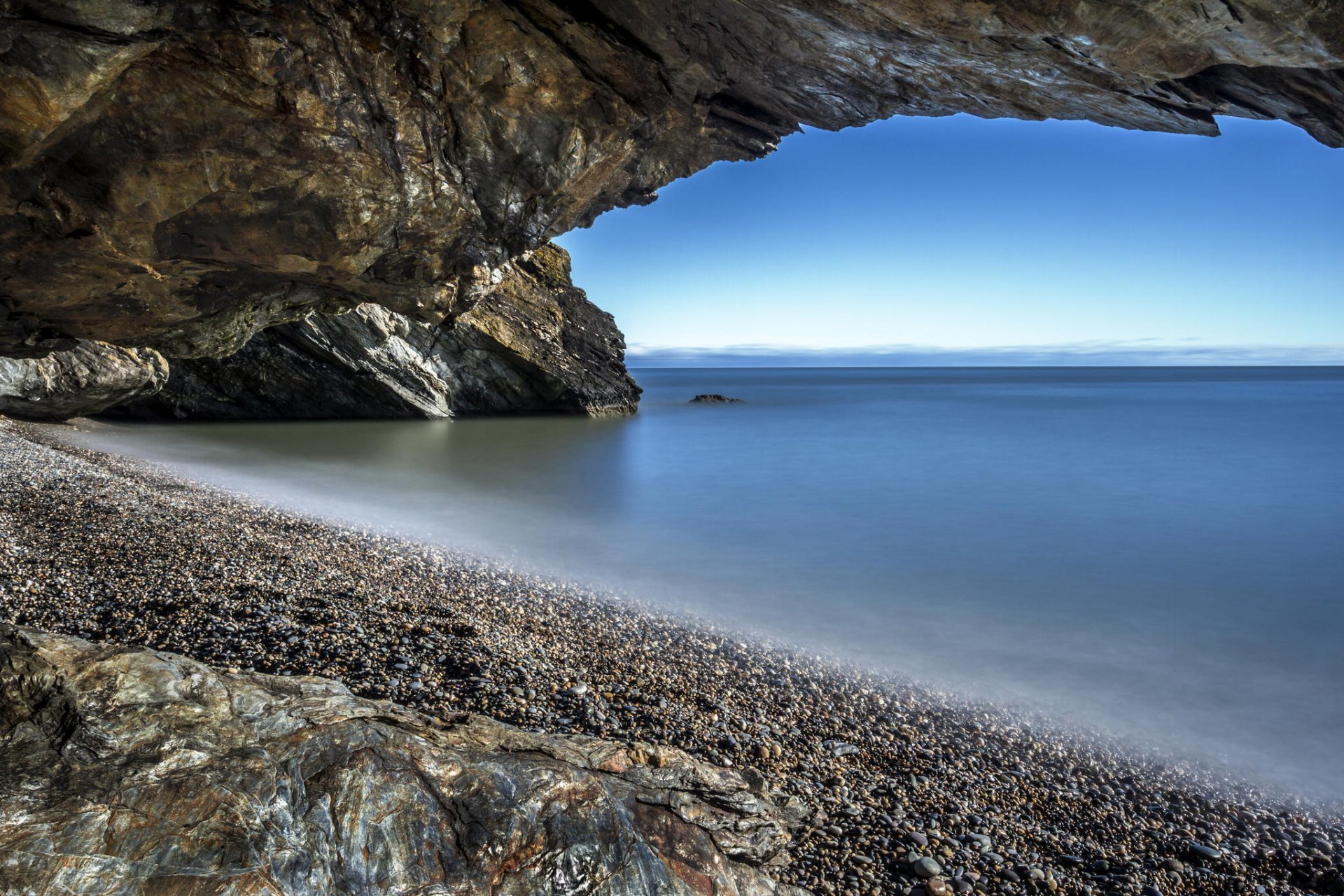 roca costa playa mar guijarros