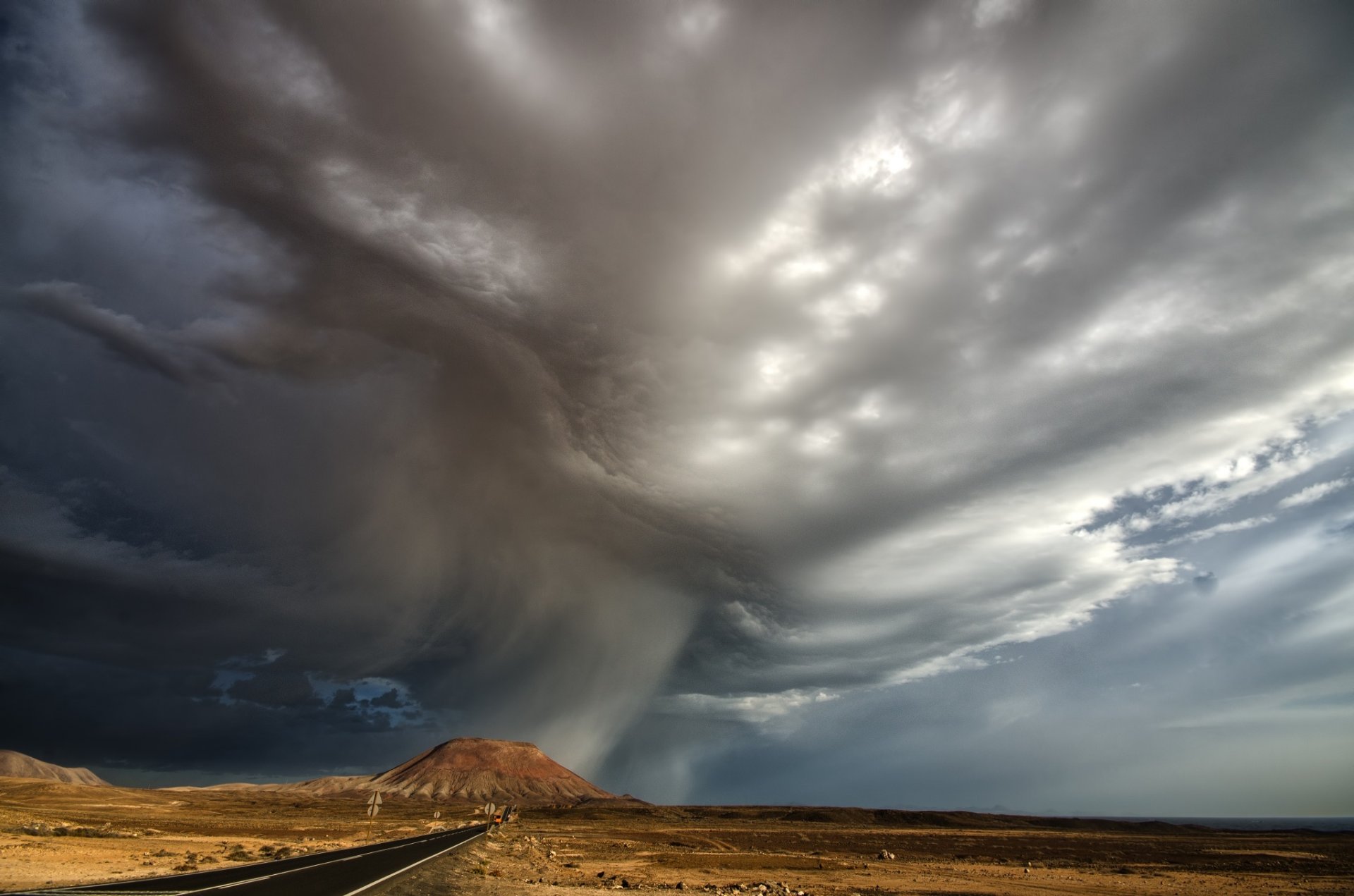 mountain road rain clouds nature