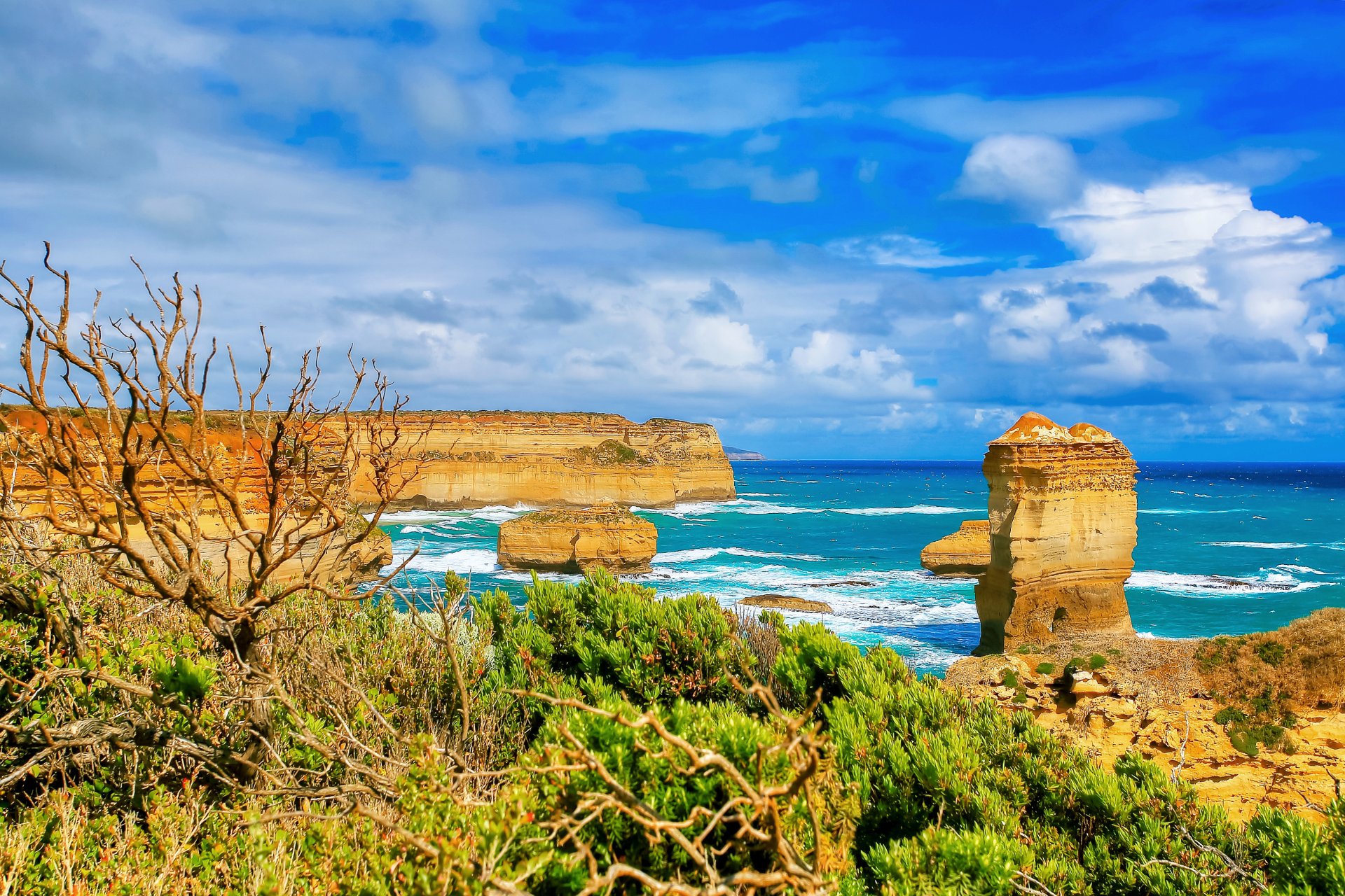 landscape ocean sea sky clouds broken rock grass horizon australia