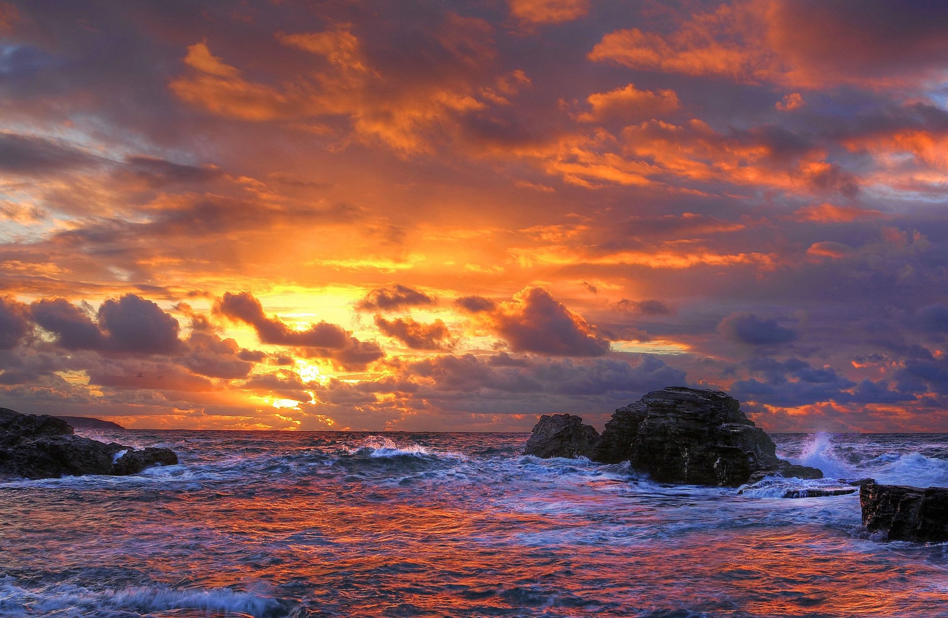 rocas mar surf puesta de sol