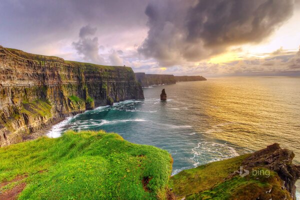 Rocks of Ireland at sunset by the sea