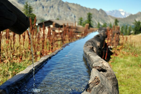 Homemade village stream in a mountain village