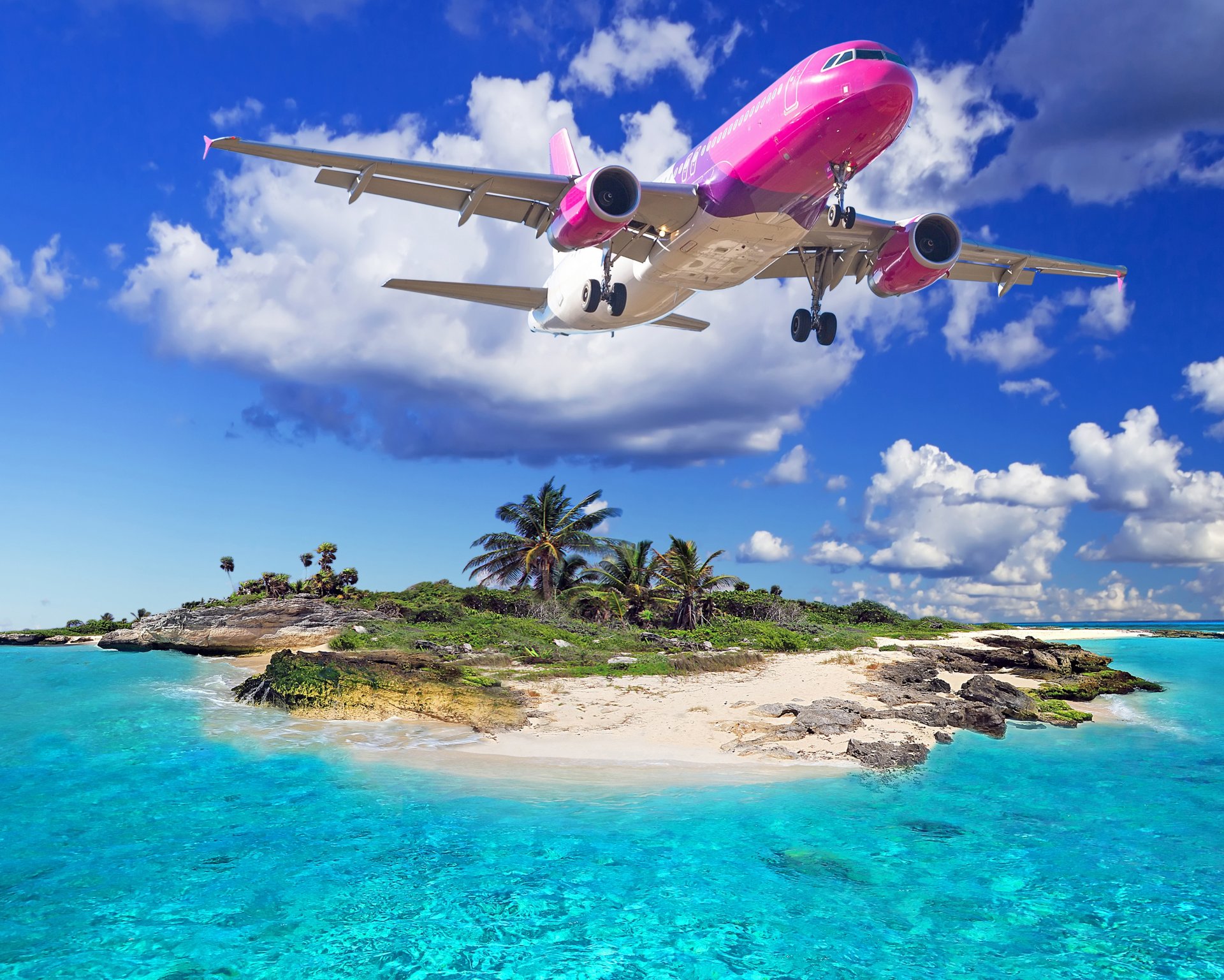 flugzeug fliegen über insel tropen strand meer fliegen über insel