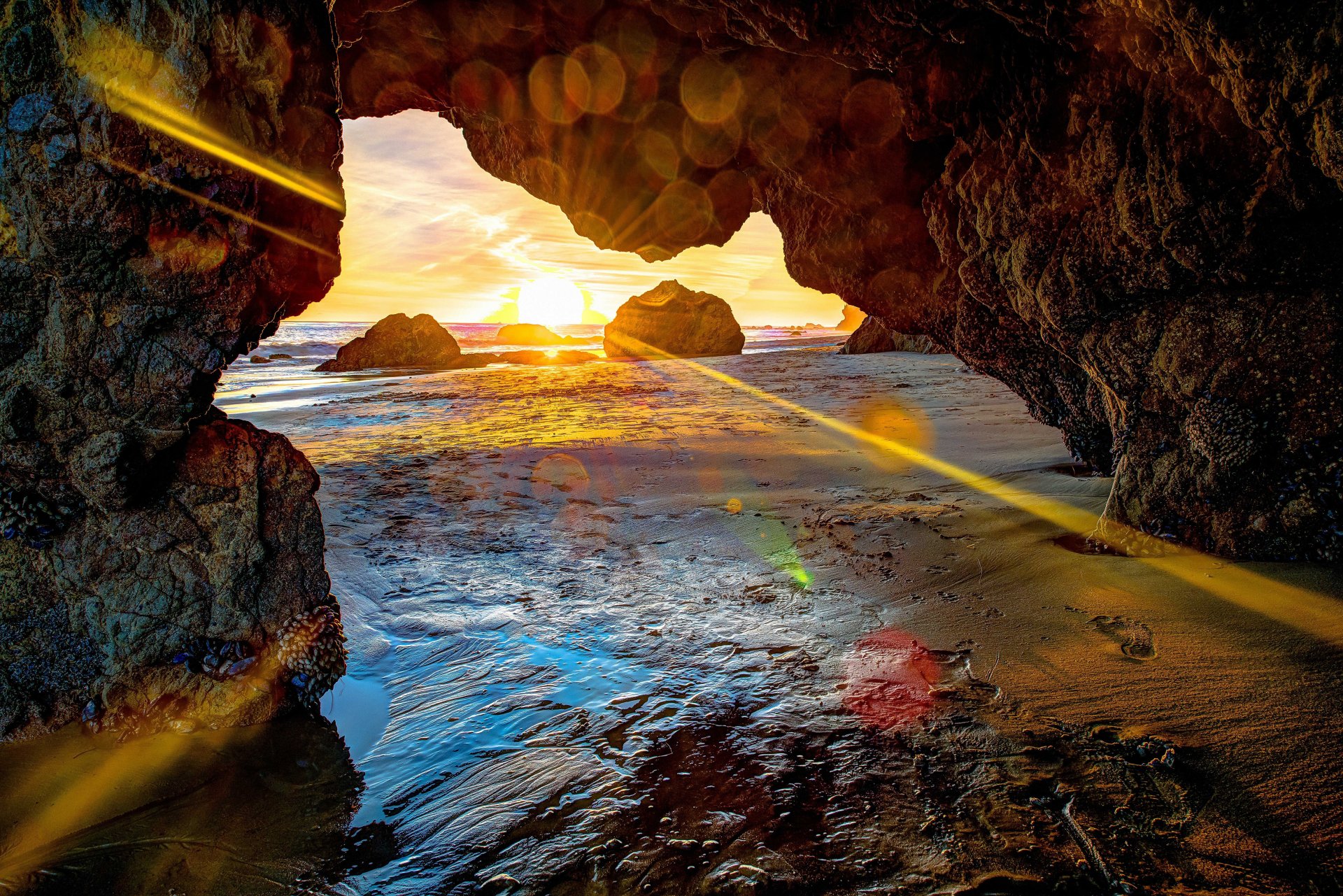 mare riva rocce tramonto paesaggio grotta grotta raggi sole pietre bagliore