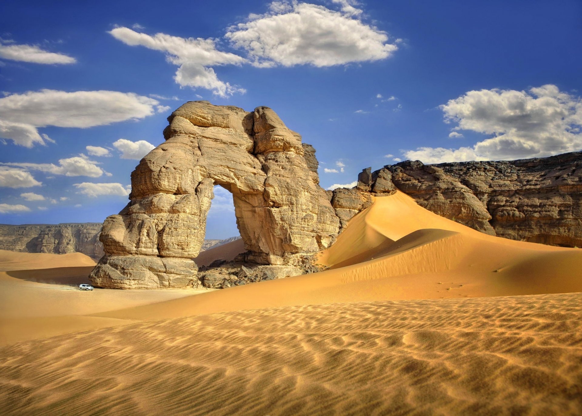 desert rock arch sand