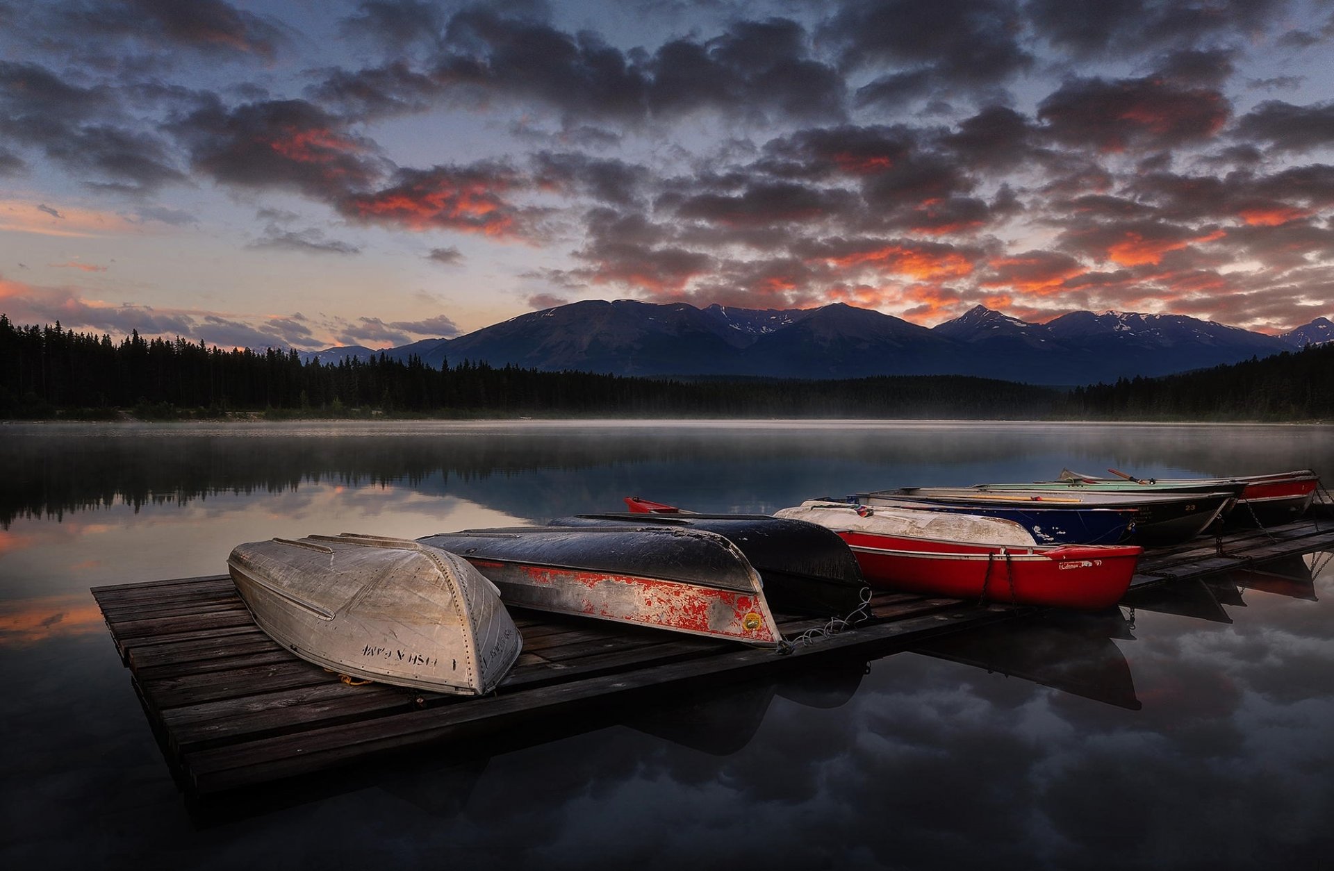 unset mountain nature landscape lake boat