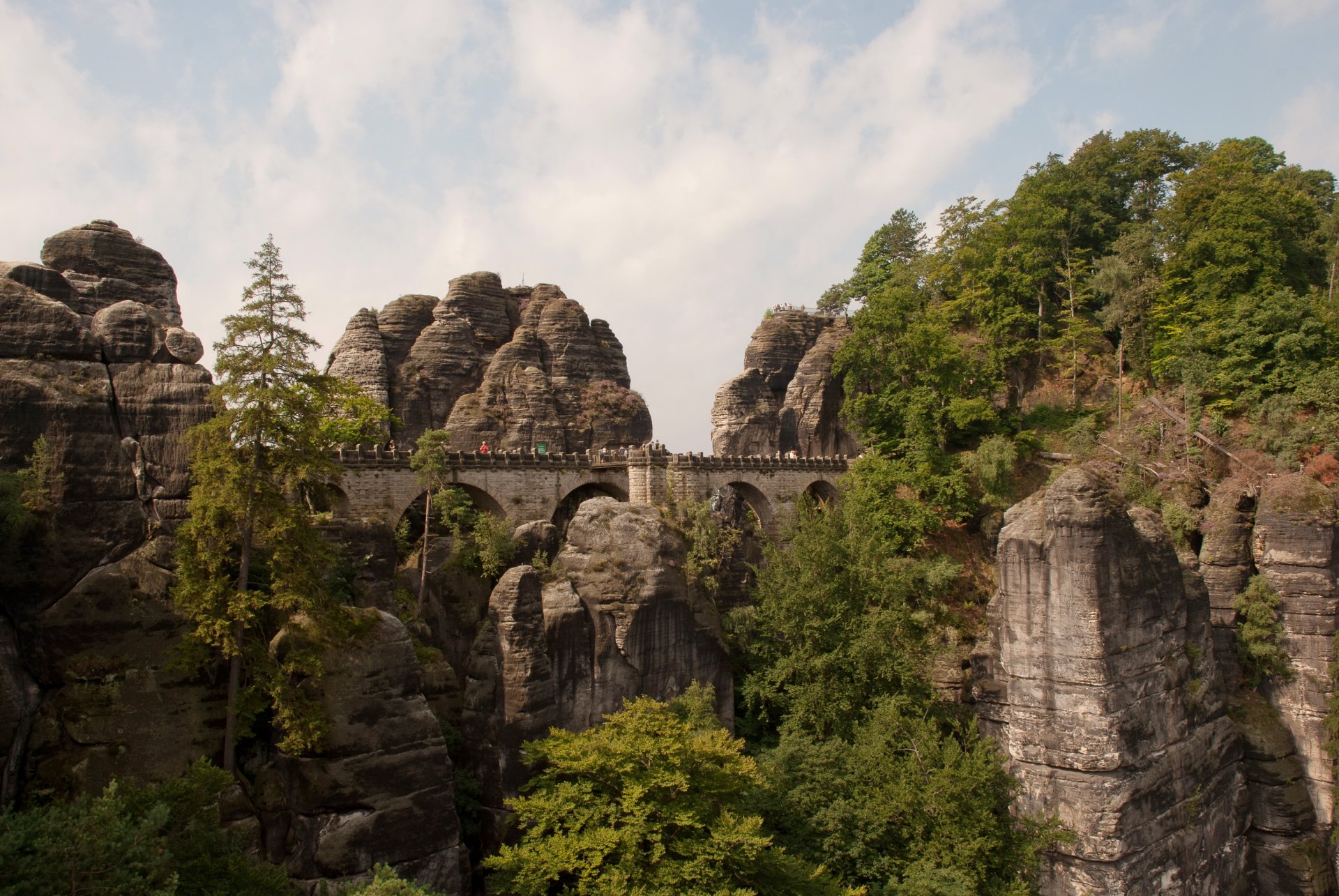 bridge germany lohmen town rock tree photo