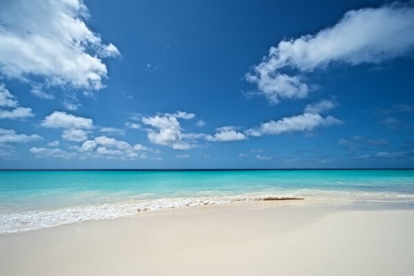 Sandy beach and waves