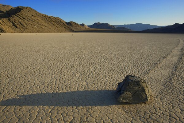 A stone in the desert among the mountains