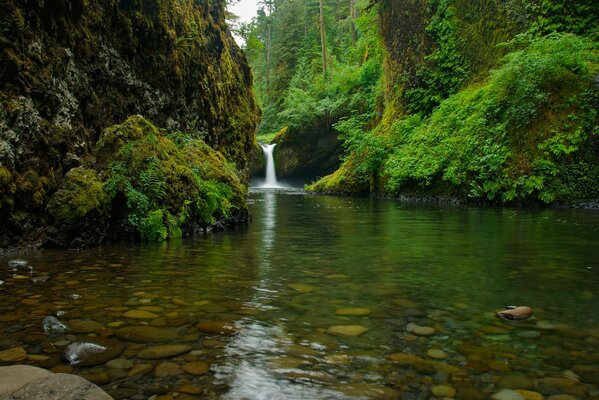 A small waterfall in a mountainous rocky area