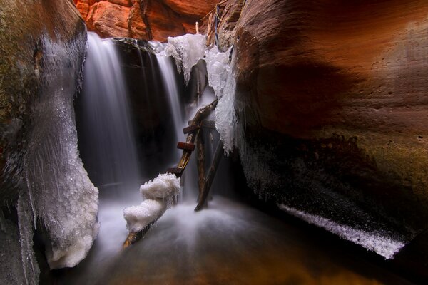 Wooden staircase surrounded by an ice cave