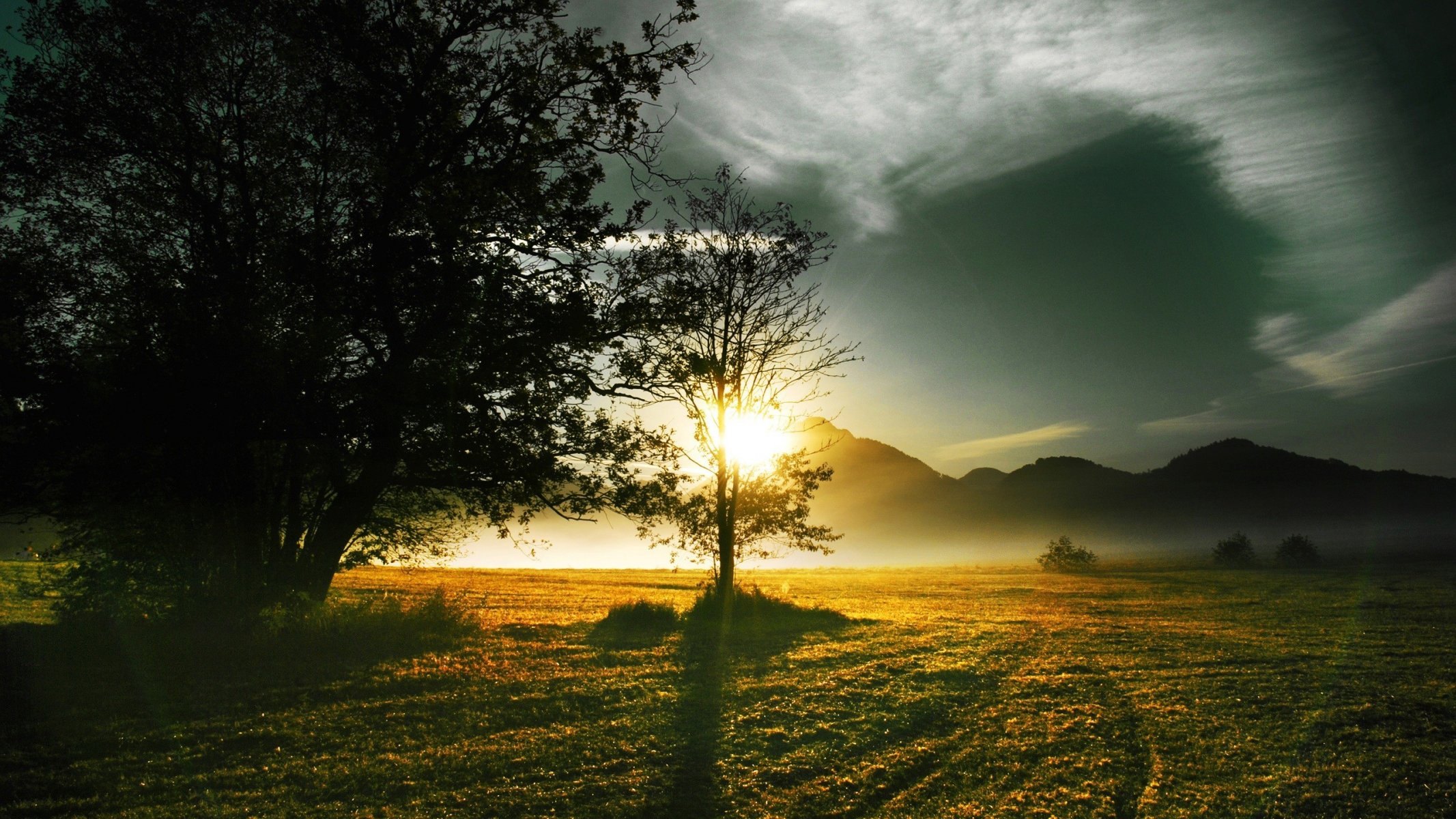 morning sun the field mountain