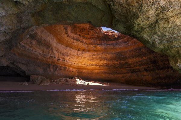 There is a secret grotto on the Algarve beach in Portugal