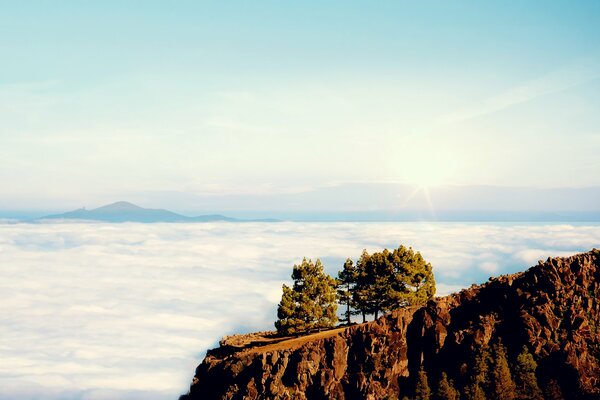 Cliff cliff above the clouds