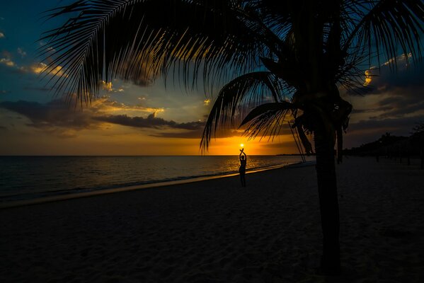 Cuba beach with sea and silhouette