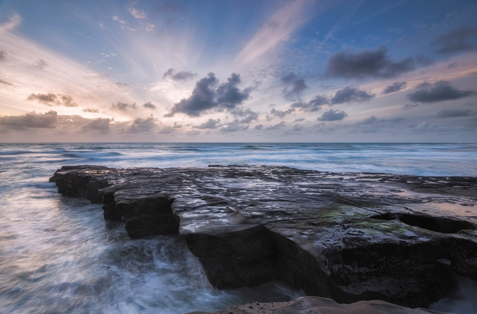 ozean brandung steine himmel wolken