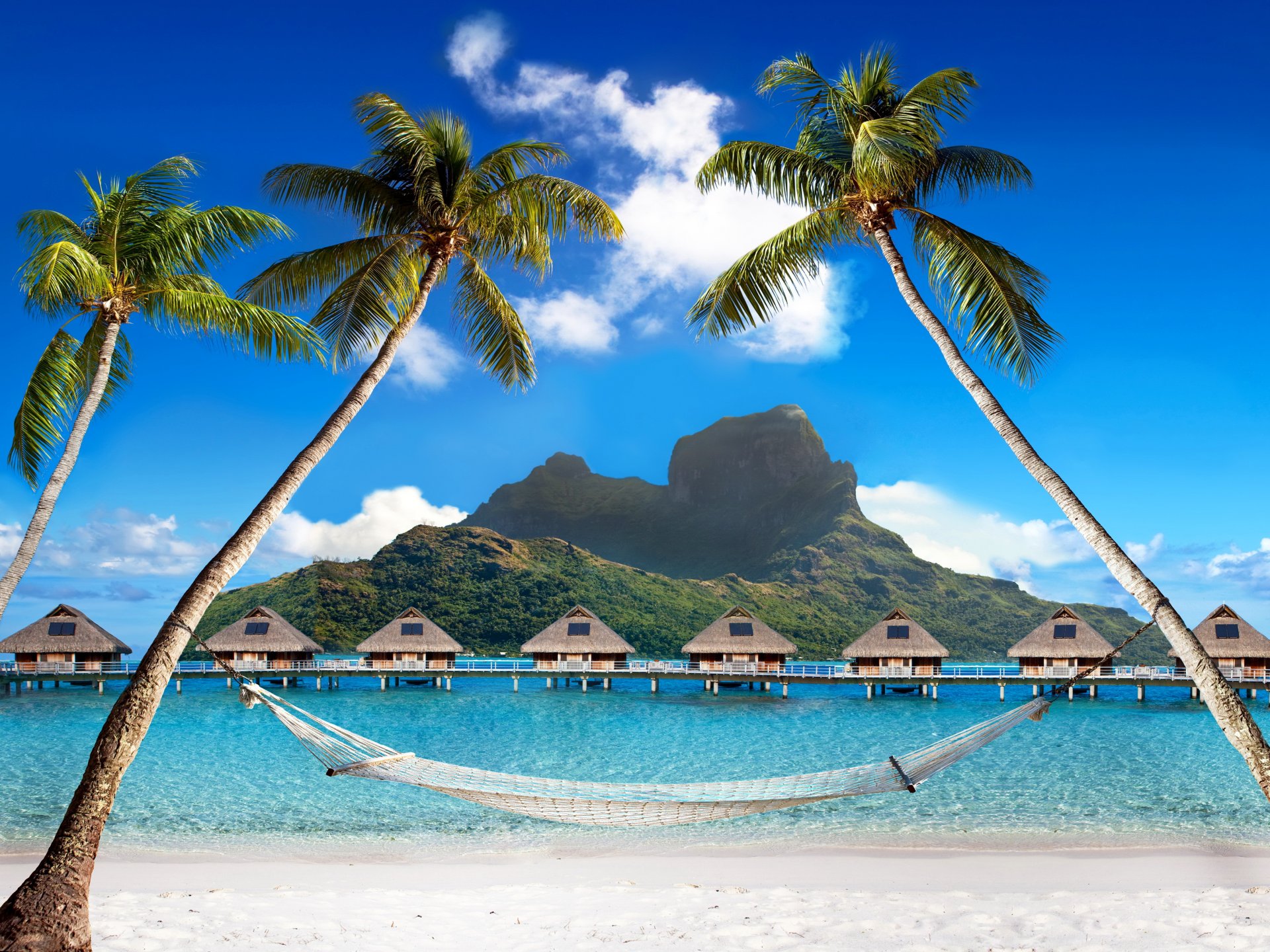 tropisch paradies strand palmen meer ozean sonne sommer urlaub hütte tropen häuser