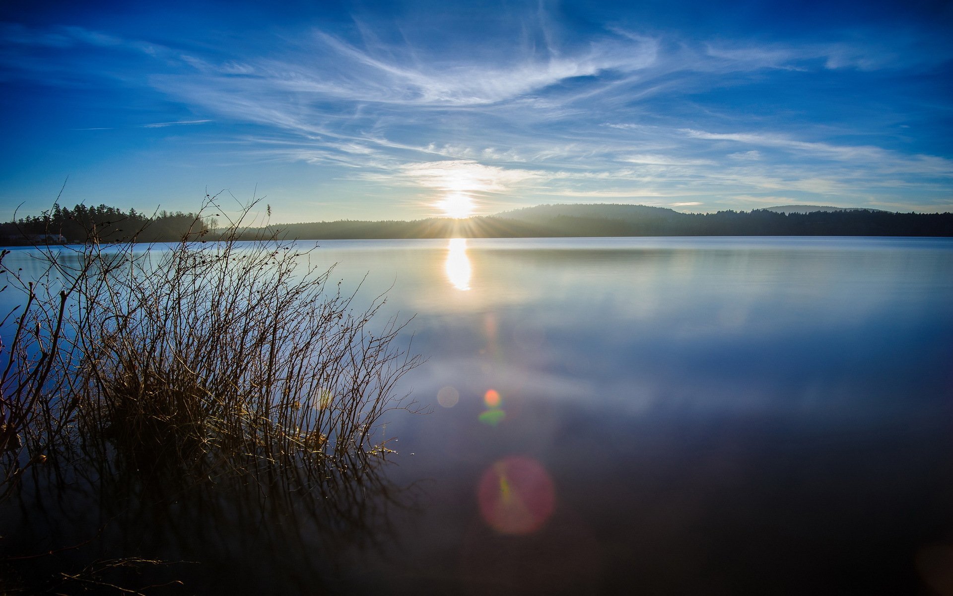 hills forest lake sun reflection