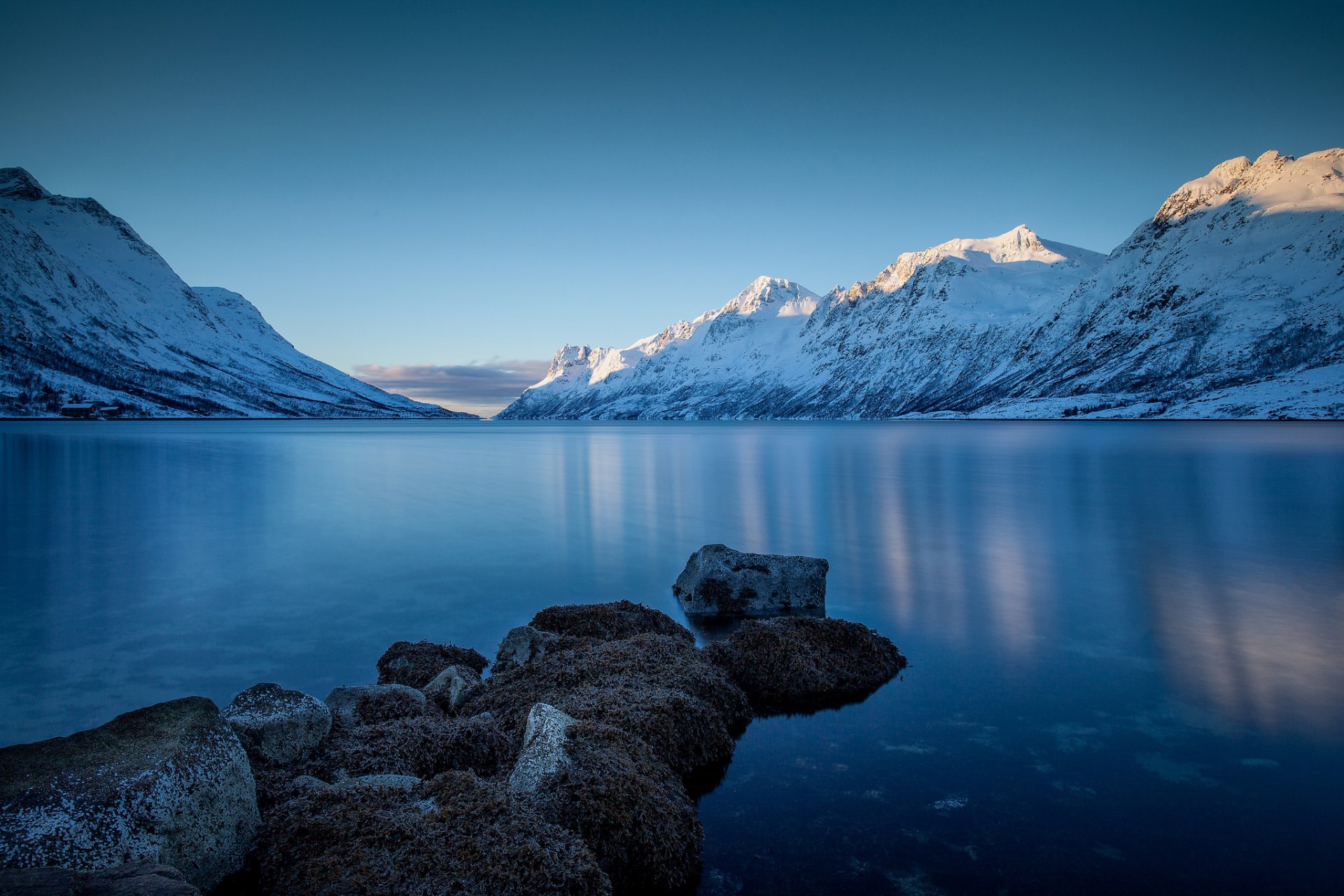 mountain snow winter lake stones beach landscape nature