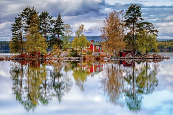 Lac d automne avec une maison