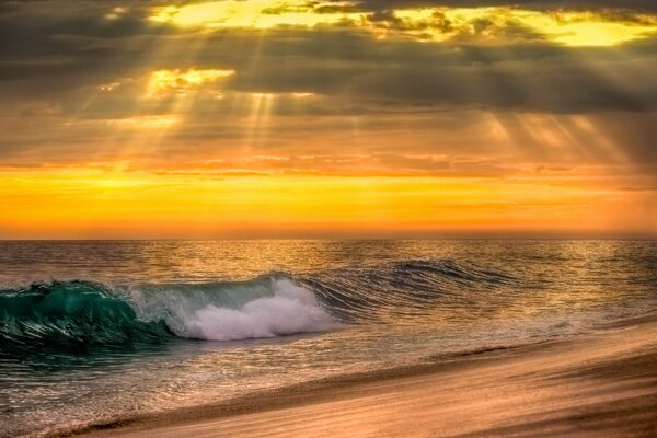 The rays of the sun break through the evening clouds