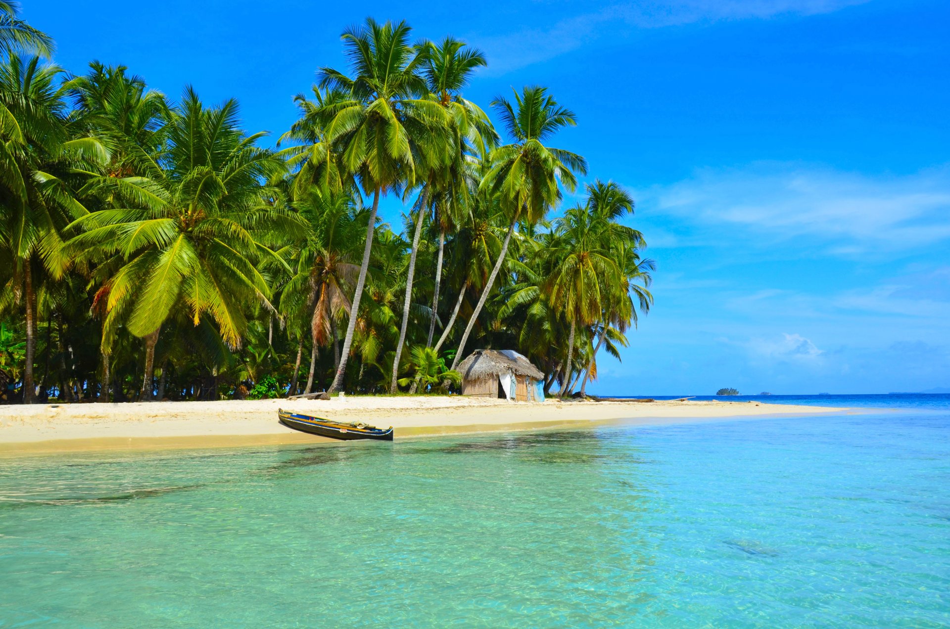 tropiques mer plage bateau palmiers maisonnette