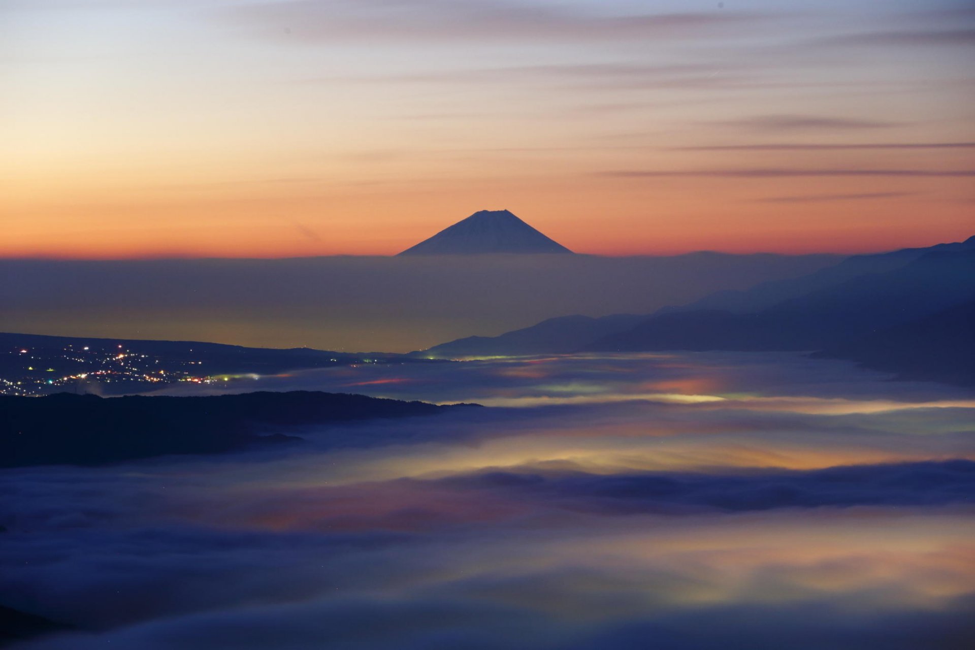 fuji japan mountain clouds dawn landscape nature haze town glow