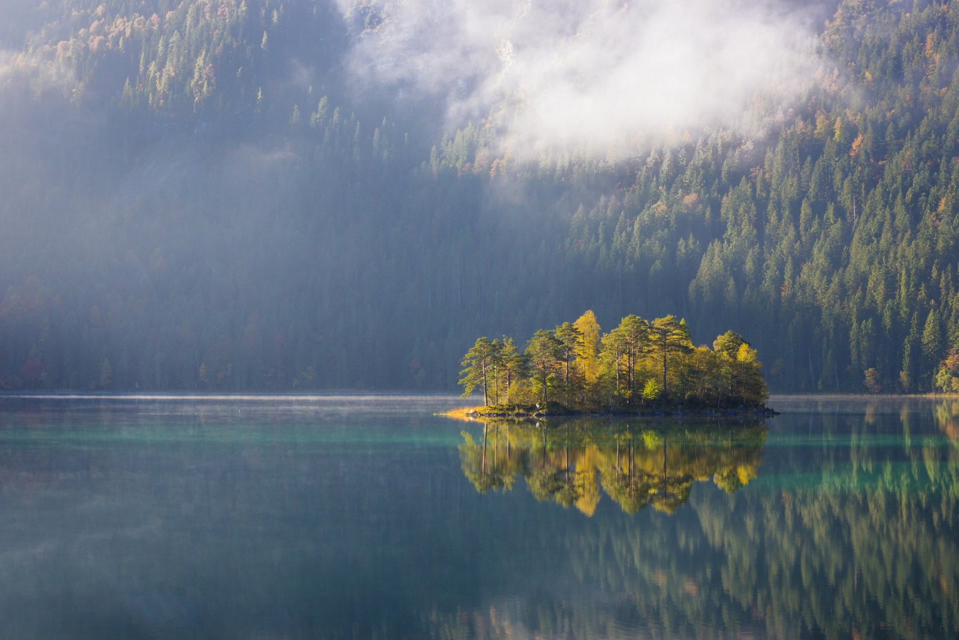 mountain slope forest lake island reflection autumn