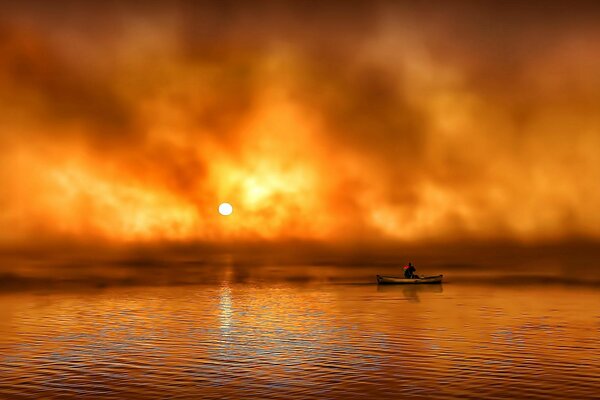 Au lever du soleil dans le brouillard de l homme dans le bateau