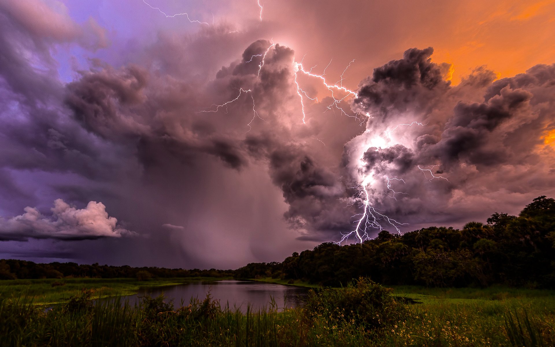 thunderstorm lightning clouds sky clouds storm evening lake trees nature