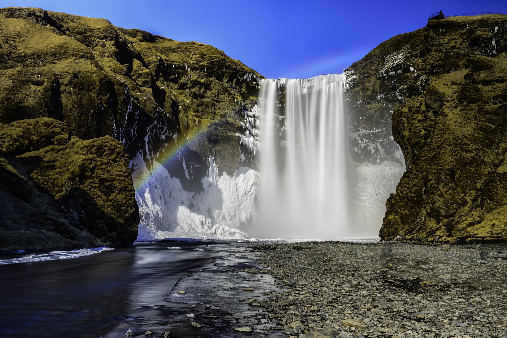 kogafoss islandia wodospad skogafoss rzeka skały tęcza