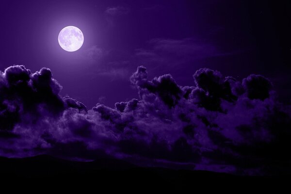 Purple night clouds with moon