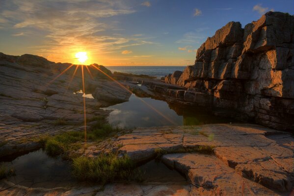 Magical sunset on the rocks of stones