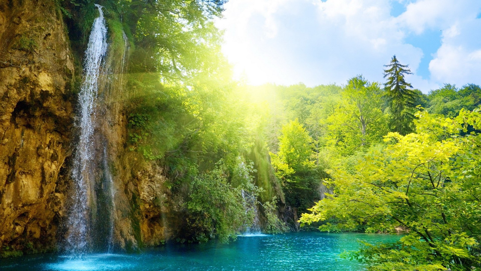 unny waterfall forest sky sun water