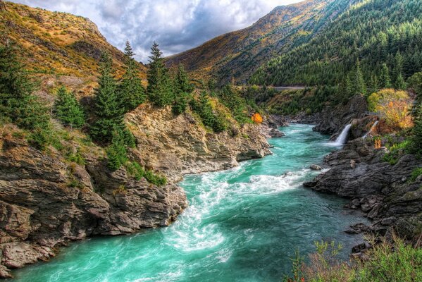 Incredible color of water in a New Zealand mountain river